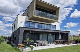Villen zu kaufen in 2201 Gerasdorf, Energieeffiziente, supercoole Architekten-Villa mit exklusiver Ausstattung am Wiener Stadtrand