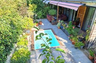 Wohnung kaufen in Moosweg, 4812 Pinsdorf, Traumhafte Gartenwohnung mit Pool für Naturliebhaber in Massivholzbauweise in Pinsdorf bei Gmunden