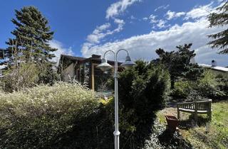 Einfamilienhaus kaufen in 2603 Felixdorf, Bungalow mit großem Wintergarten und herrlichem Naturgarten