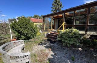 Einfamilienhaus kaufen in 2603 Felixdorf, Bungalow mit großem Wintergarten und herrlichem Naturgarten