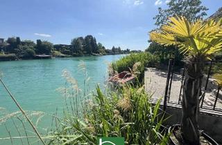 Haus kaufen in 2301 Groß-Enzersdorf, RUHIGES WOHNEN DIREKT AM WASSER! Bungalow mit Blick ins Grüne & direktem Badezugang! Erholung pur! Möbliert!