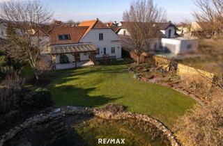 Einfamilienhaus kaufen in 3133 Gemeinlebarn, Exquisites Einfamilienhaus mit großem Garten und Schwimmteich